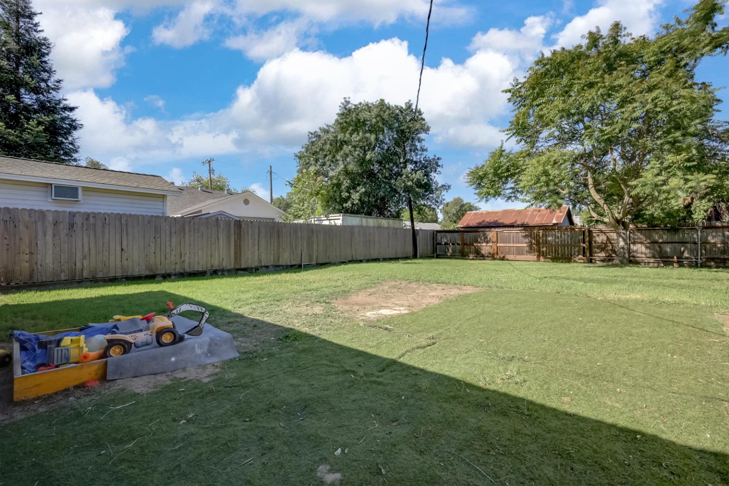 2130 Palm Street Sutter, CA 95982 - Photo 27 of 27 a backyard of a house with table and chairs