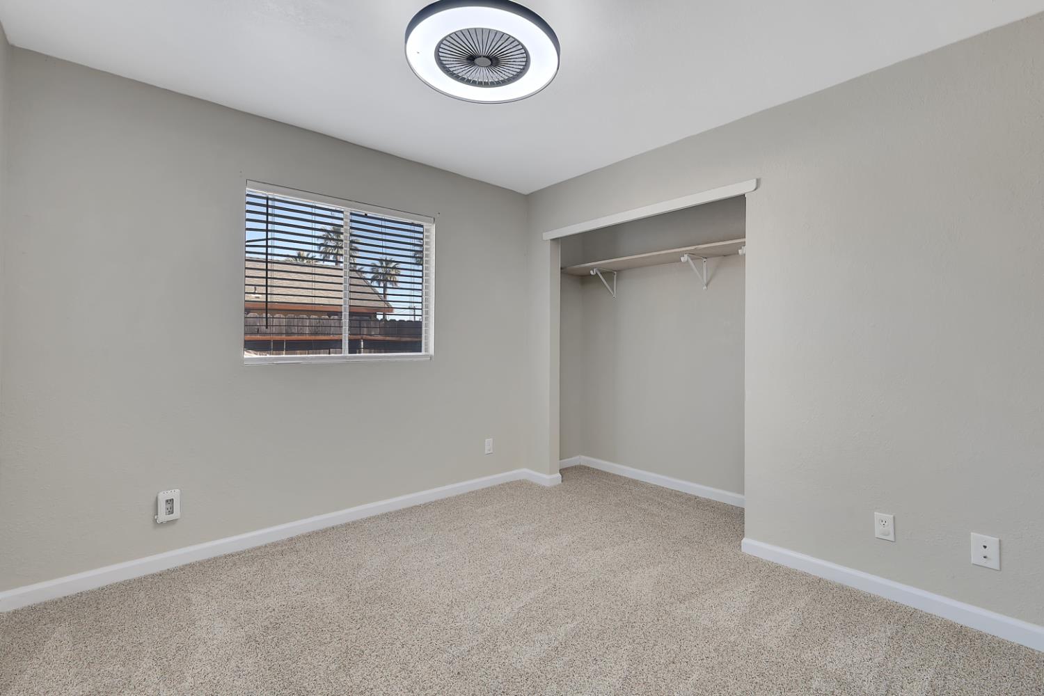 2130 Palm Street Sutter, CA 95982 - Photo 9 of 27 an empty room with windows and closet