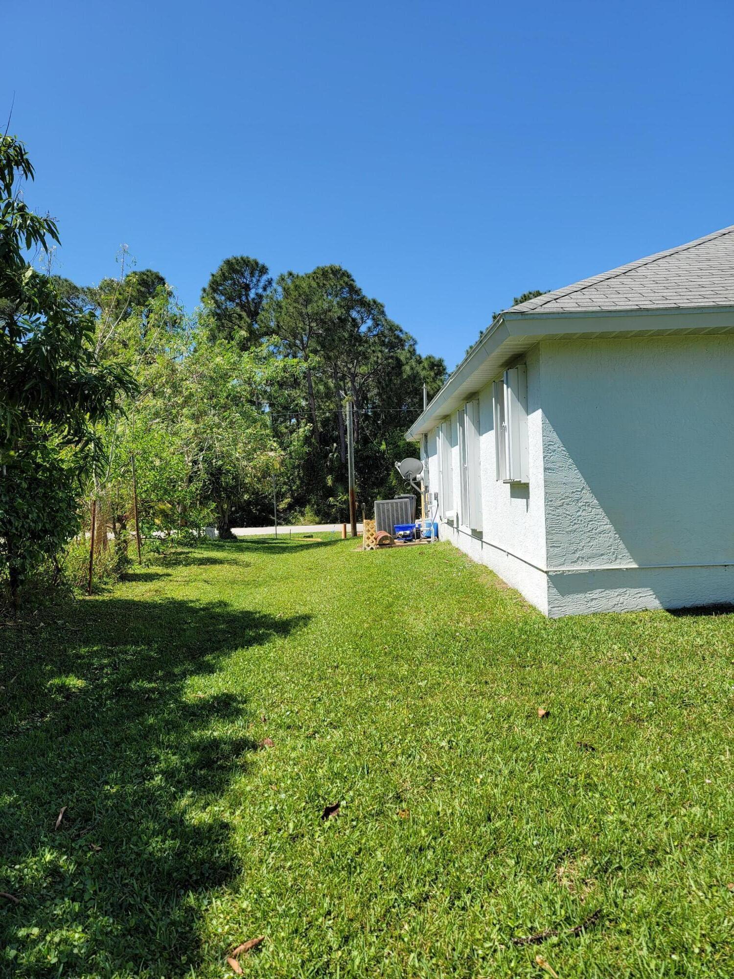 1973 Southwest Castinet Lane Port St. Lucie, FL 34953 - Photo 2 of 7 20220326_122056