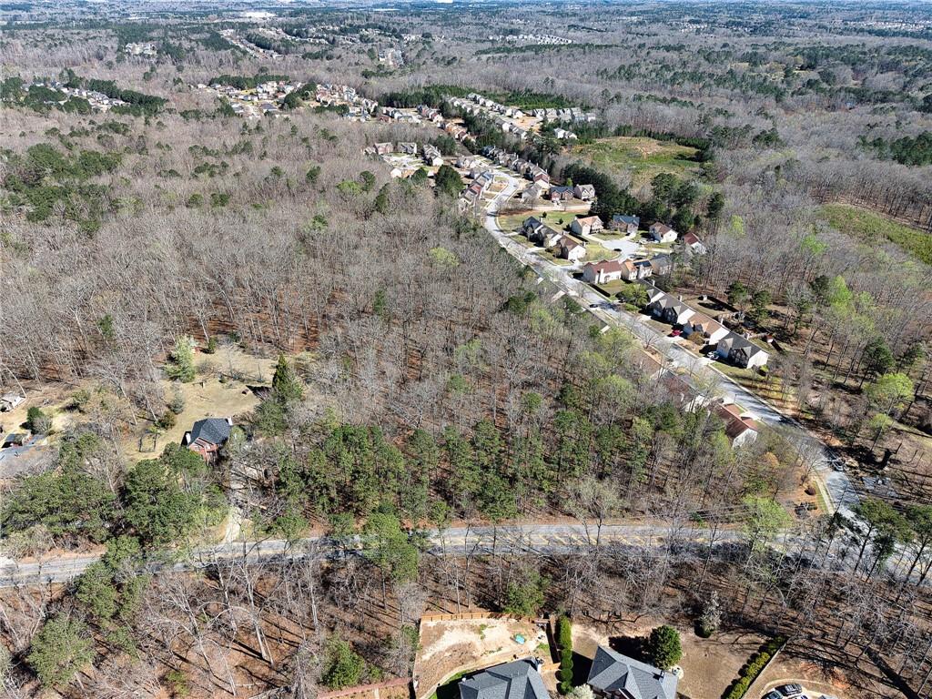 0 West Stubbs Road Atlanta, GA 30349 - Photo 17 of 19 a view of a city with green field