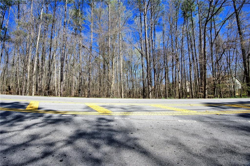 0 West Stubbs Road Atlanta, GA 30349 - Photo 4 of 19 a view of swimming pool with big yard and large trees