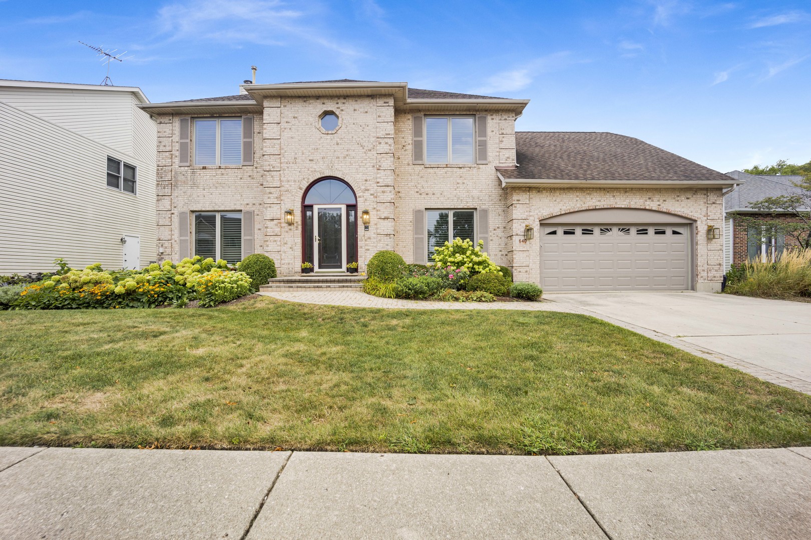 640 Downey Street Hoffman Estates, IL 60169 - Photo 1 of 1 a front view of a house with garden