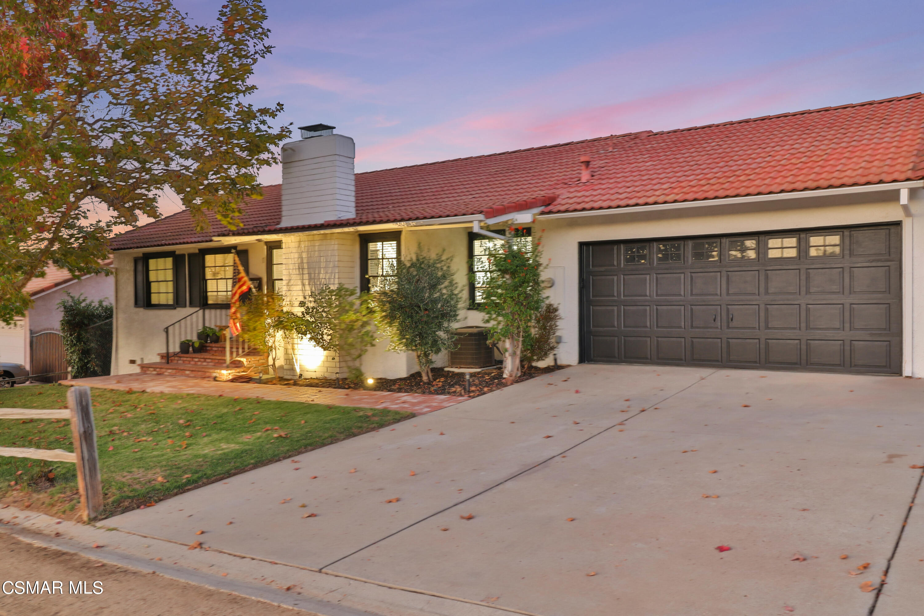1193 Nonchalant Drive Simi Valley, CA 93065 - Photo 2 of 82 a front view of a house with garden