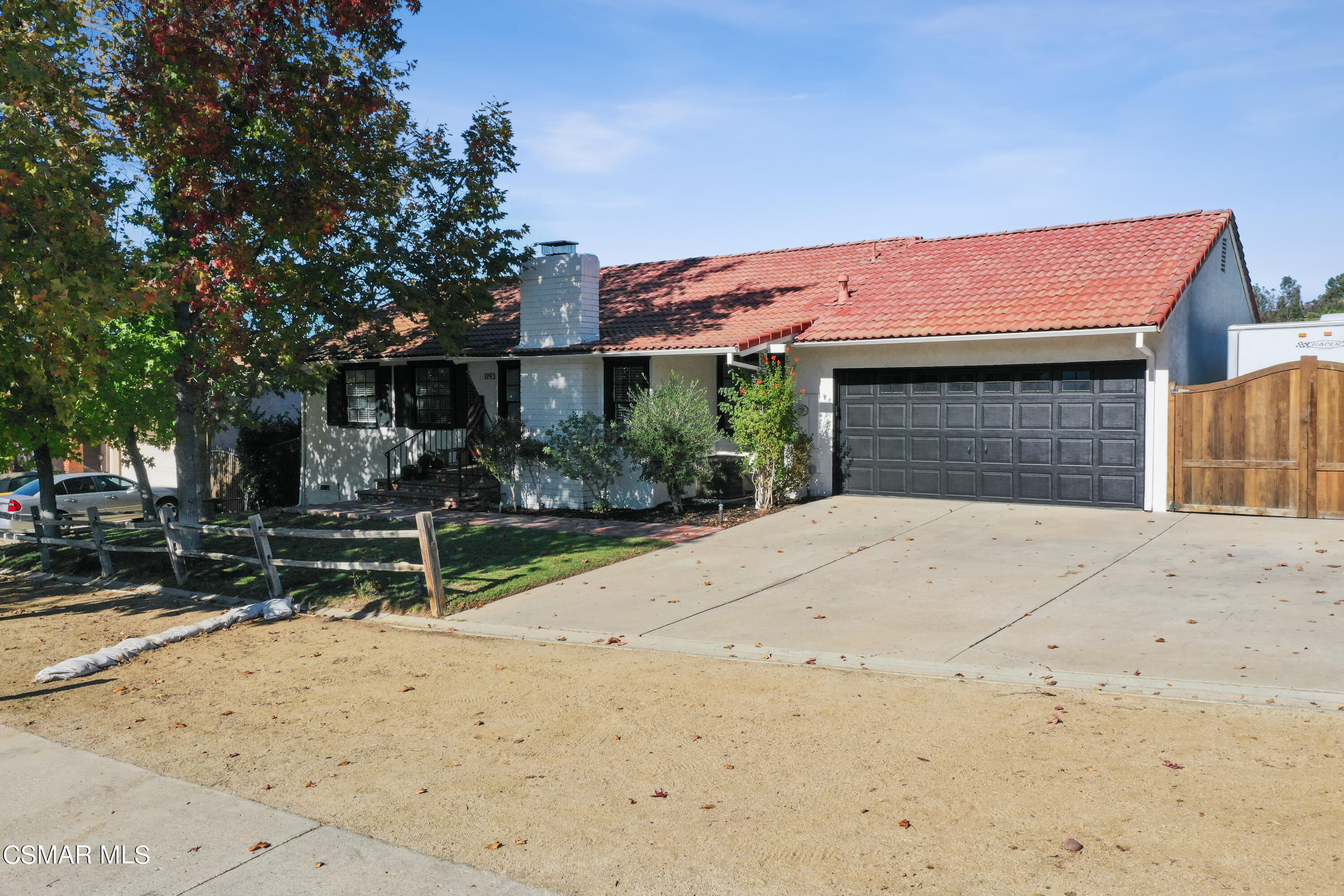 1193 Nonchalant Drive Simi Valley, CA 93065 - Photo 25 of 82 a front view of a house with garden