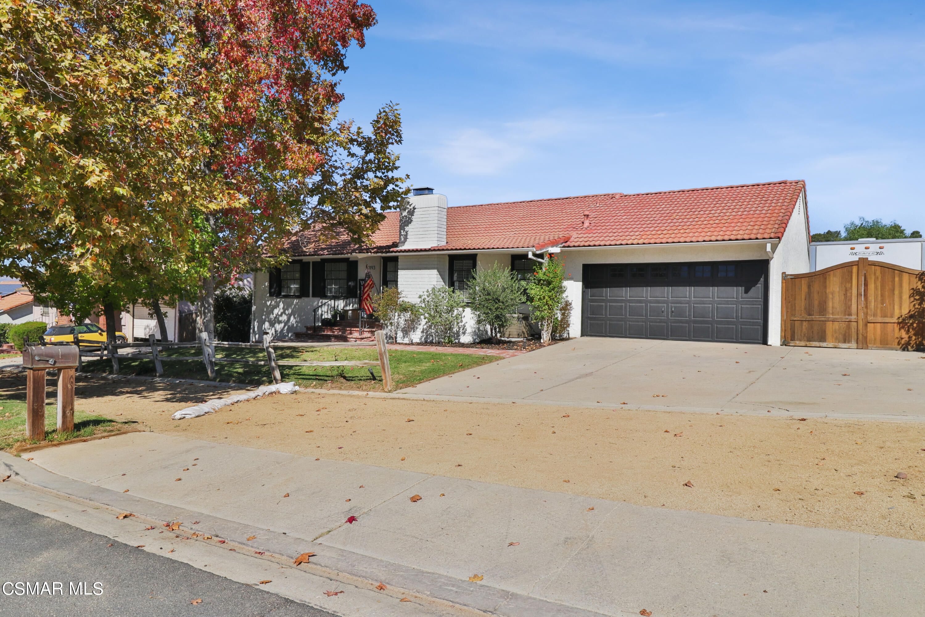 1193 Nonchalant Drive Simi Valley, CA 93065 - Photo 26 of 82 a front view of a building with palm trees
