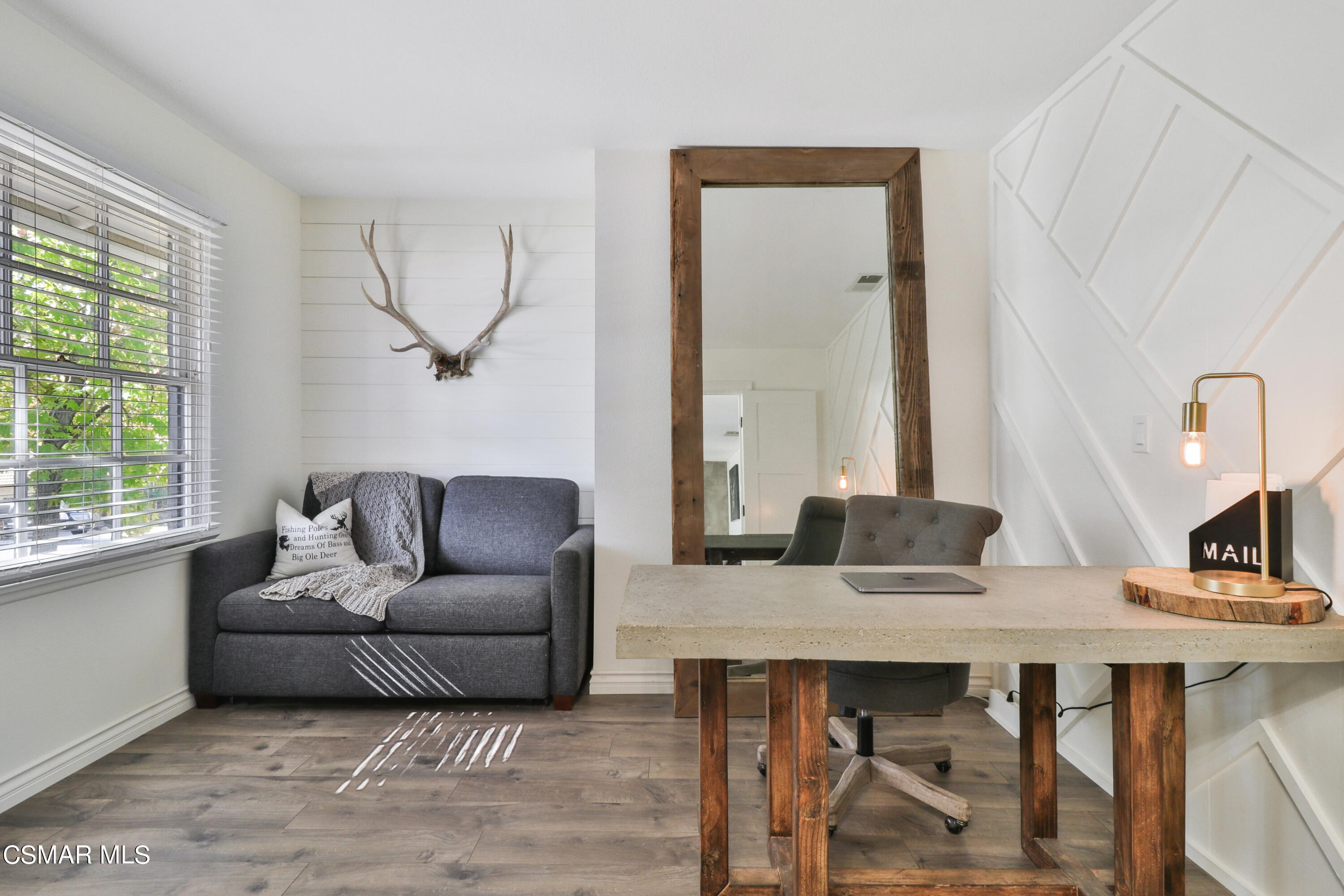1193 Nonchalant Drive Simi Valley, CA 93065 - Photo 35 of 82 a living room with furniture and a window