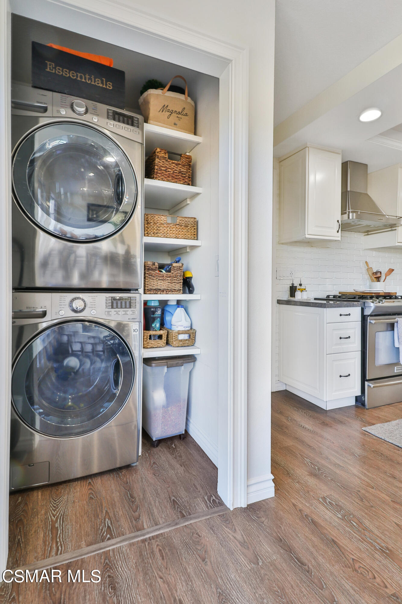 1193 Nonchalant Drive Simi Valley, CA 93065 - Photo 42 of 82 a view of a kitchen with a sink and a washer dryer