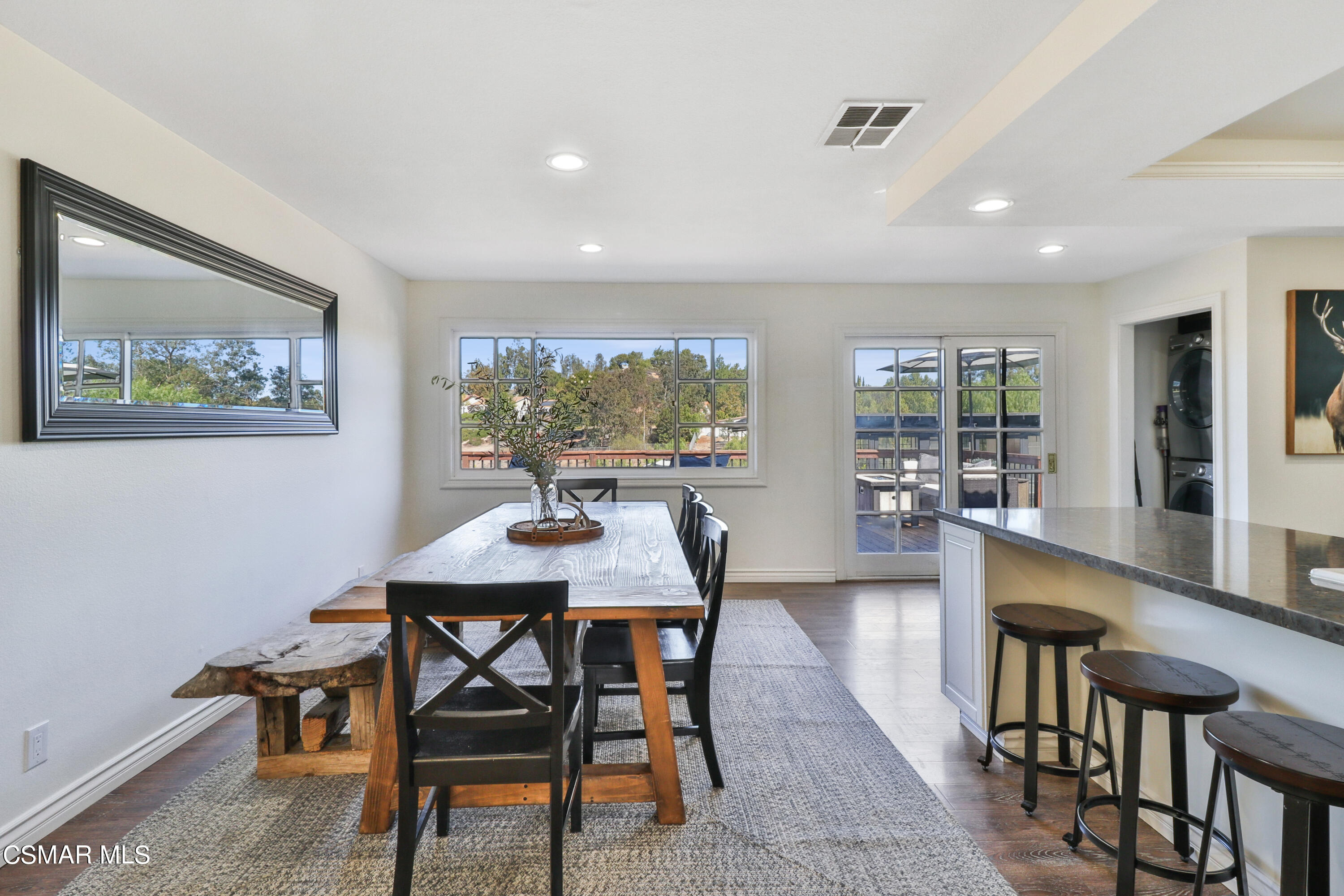 1193 Nonchalant Drive Simi Valley, CA 93065 - Photo 46 of 82 a view of a dining room with furniture window and wooden floor