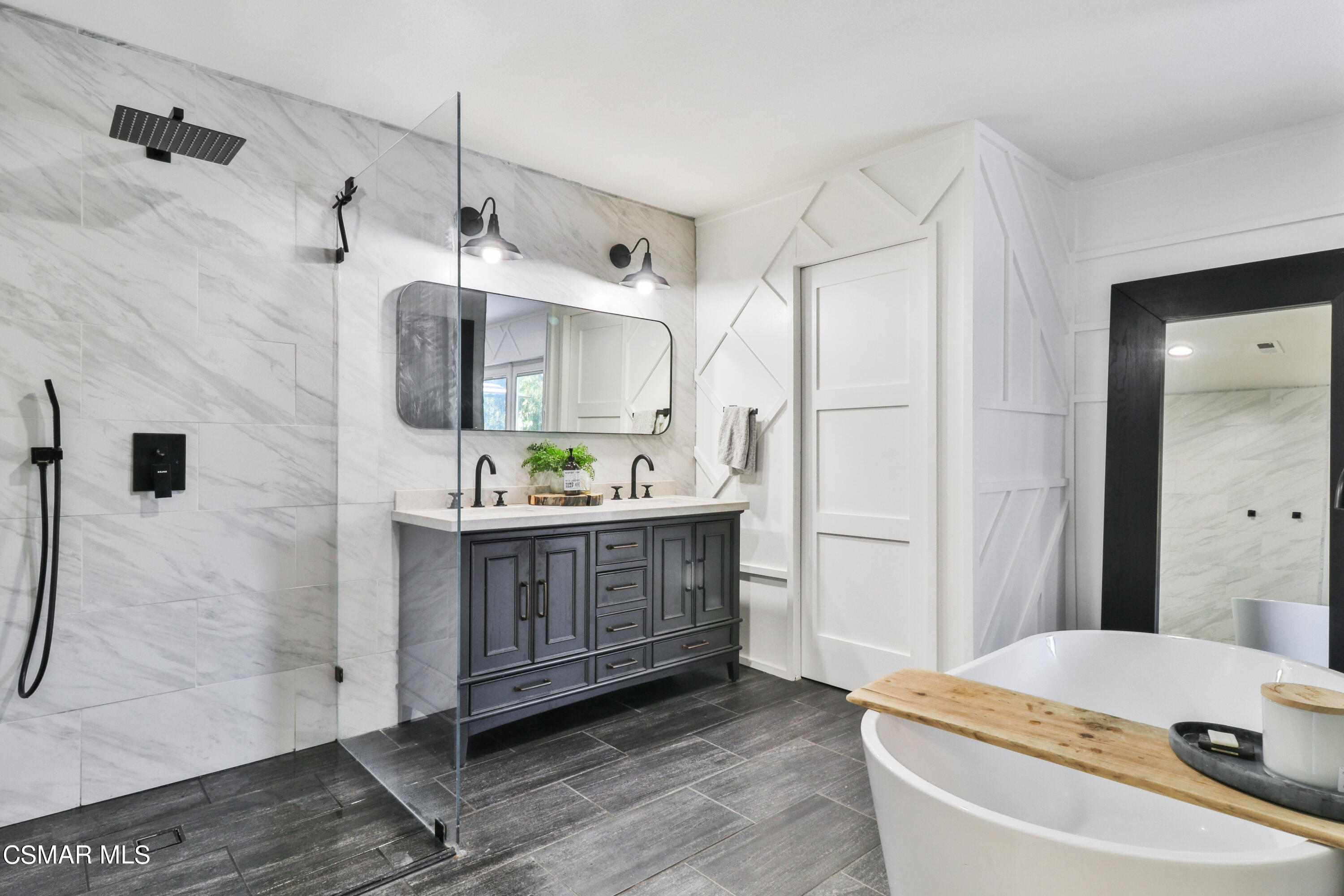 1193 Nonchalant Drive Simi Valley, CA 93065 - Photo 53 of 82 a spacious bathroom with a granite countertop sink a mirror and shower