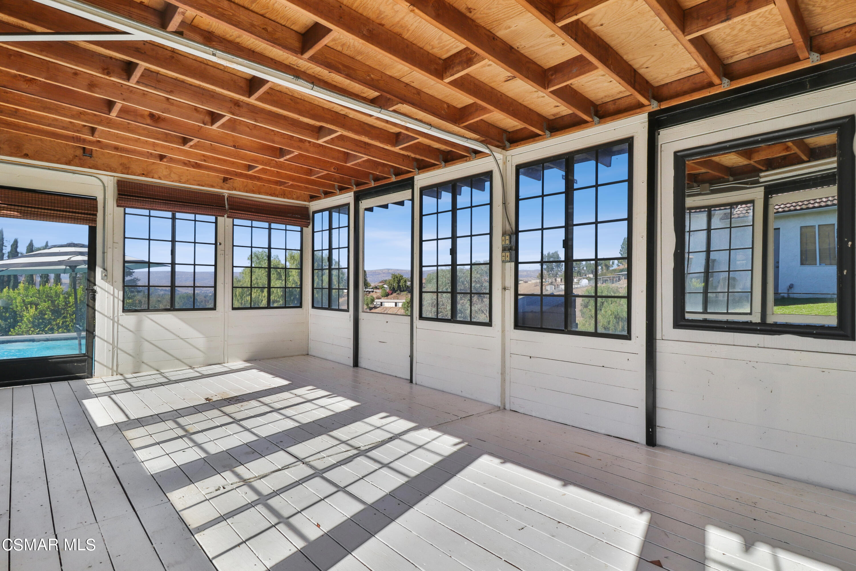1193 Nonchalant Drive Simi Valley, CA 93065 - Photo 72 of 82 a spacious bedroom with a large bed and a large window