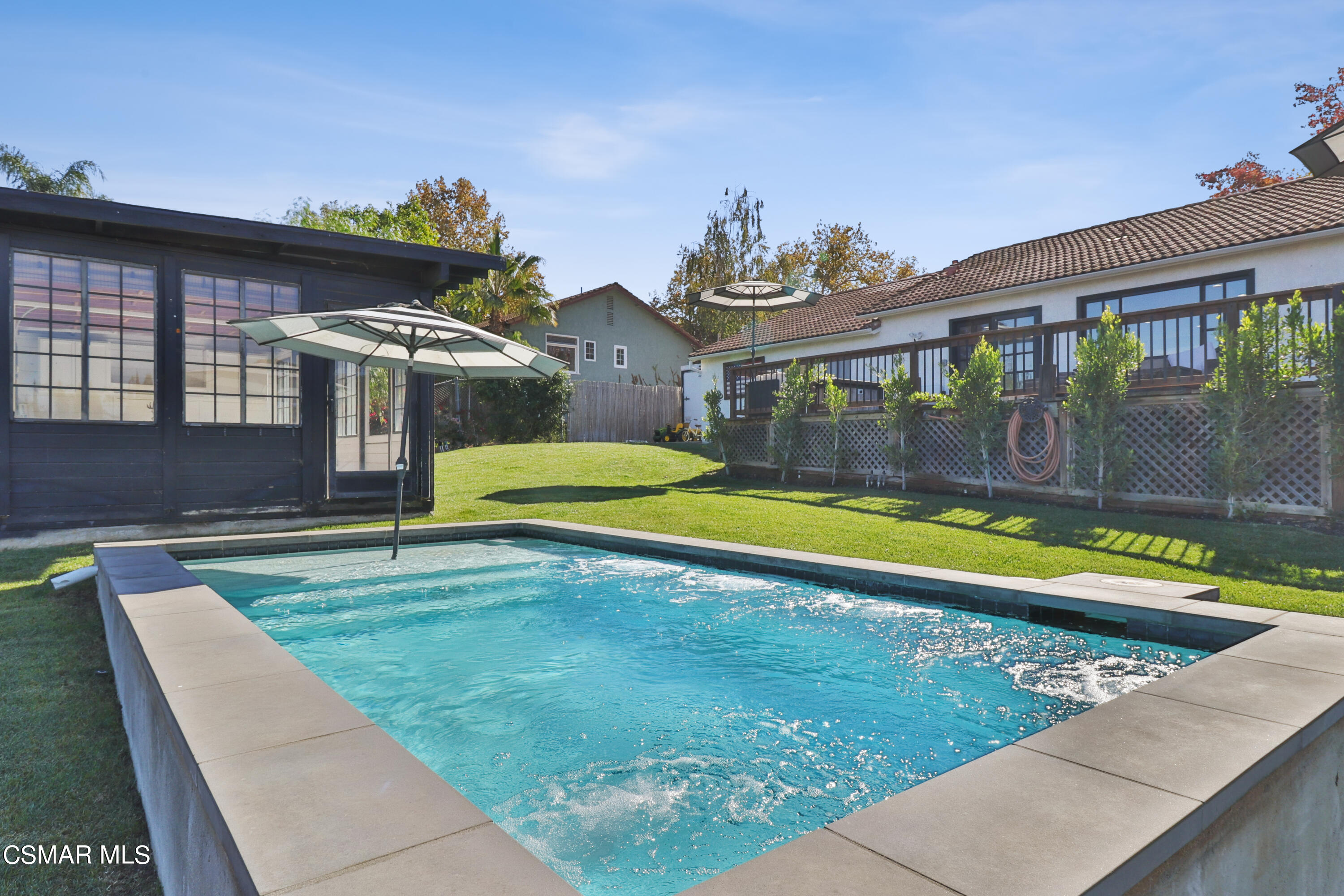 1193 Nonchalant Drive Simi Valley, CA 93065 - Photo 76 of 82 a view of a house with swimming pool