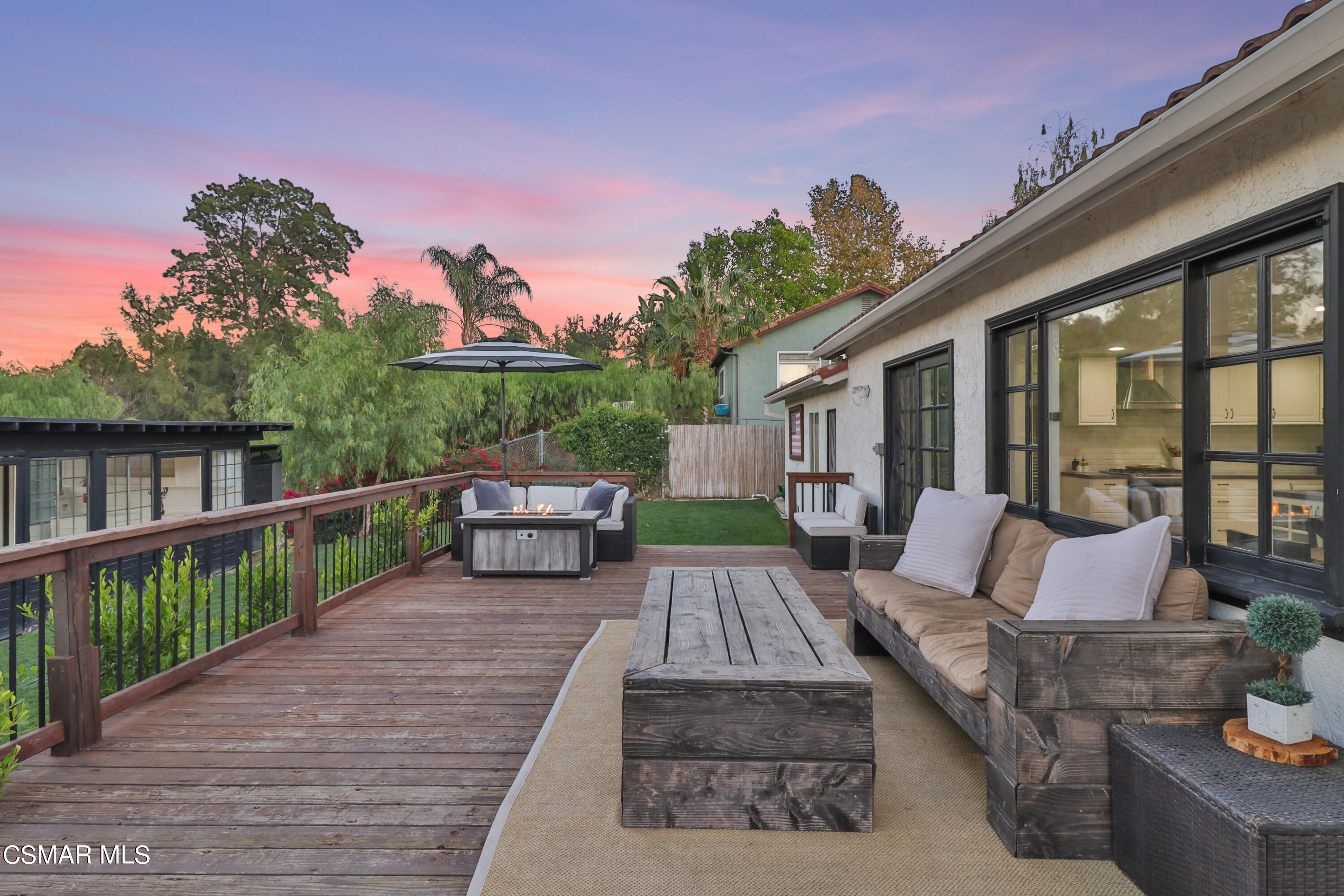 1193 Nonchalant Drive Simi Valley, CA 93065 - Photo 9 of 82 a view of a patio with couches chairs and wooden floor