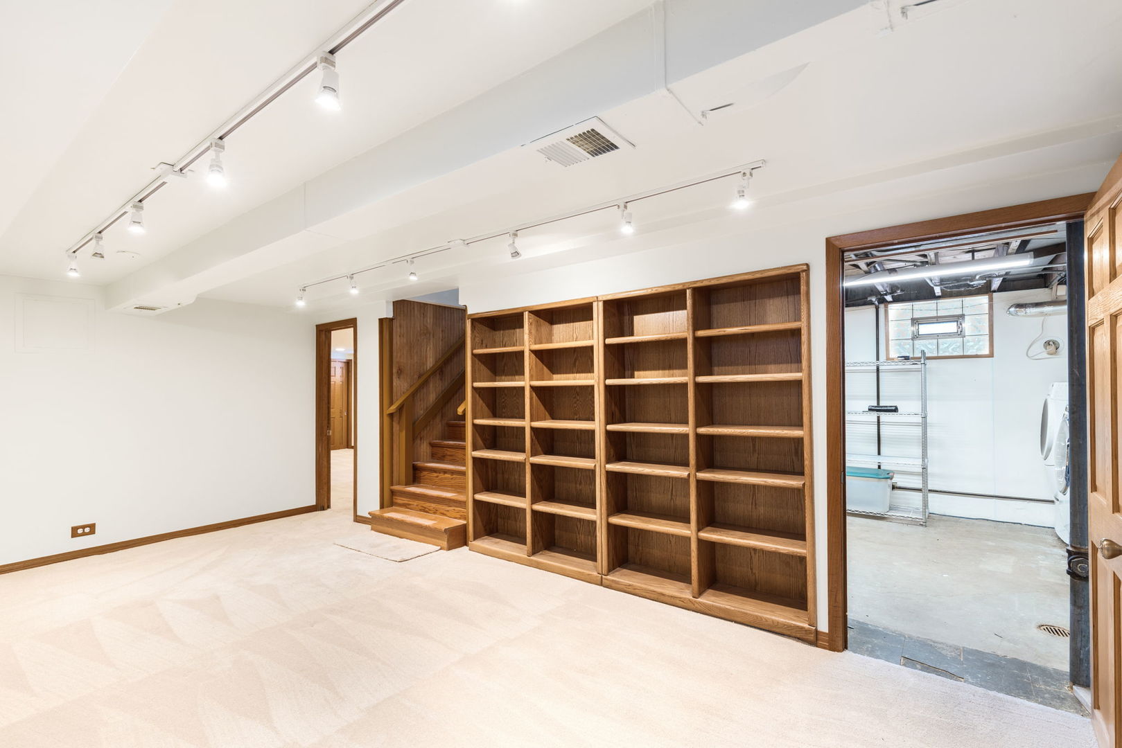 428 Callan Avenue Evanston, IL 60202 - Photo 12 of 21 a view of an empty room with a cabinet and a window