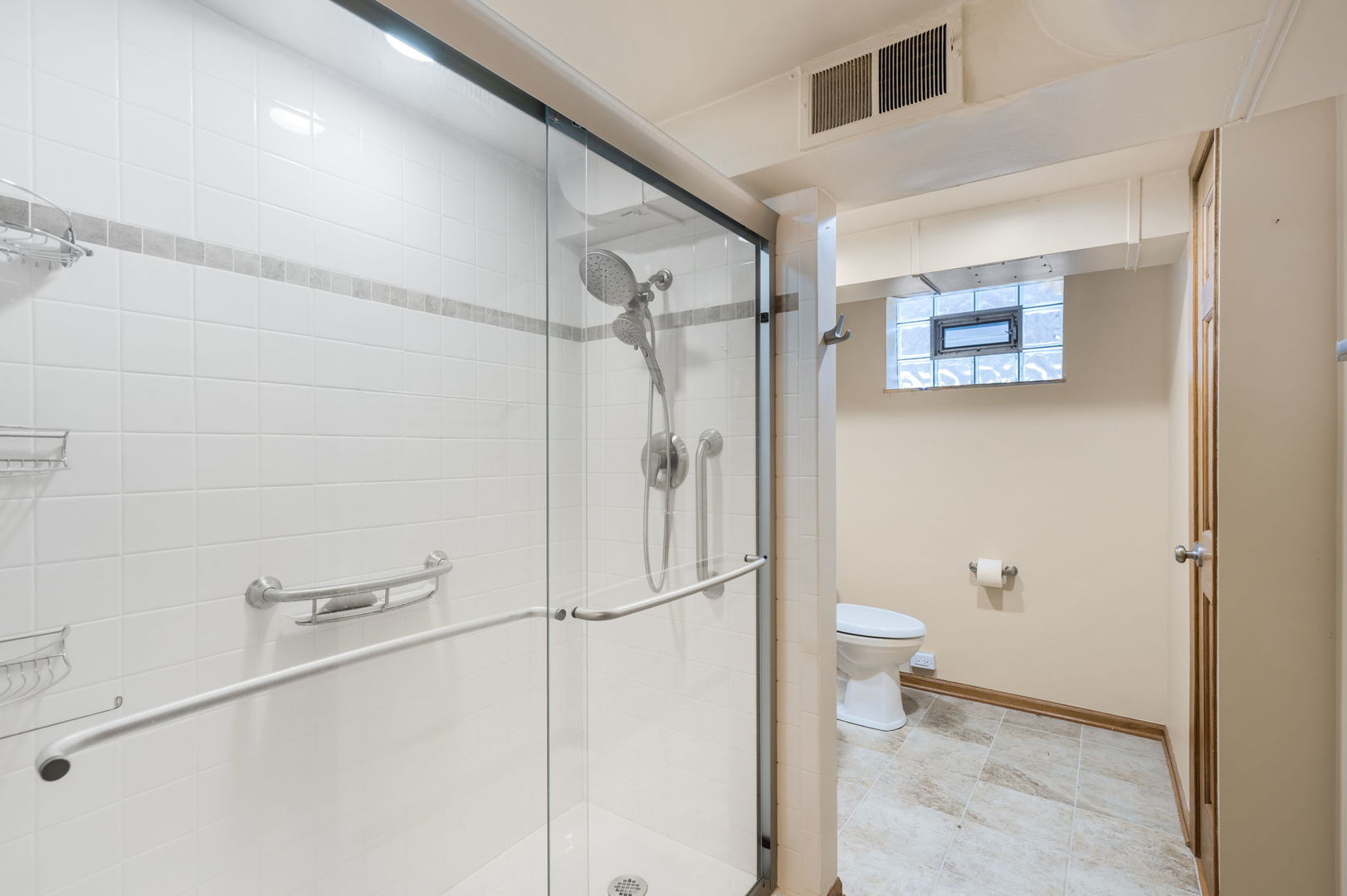 428 Callan Avenue Evanston, IL 60202 - Photo 14 of 21 a bathroom with a shower and a toilet