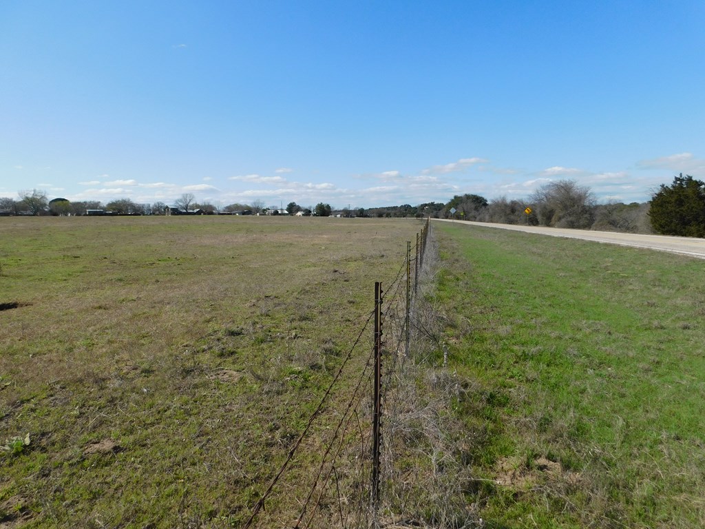 131 Elberta Street Stonewall, TX 78671 - Photo 4 of 4 a view of a lake from a yard