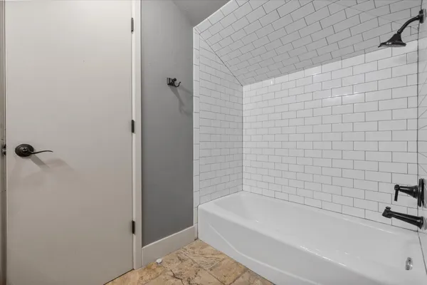 a bathroom with a bathtub