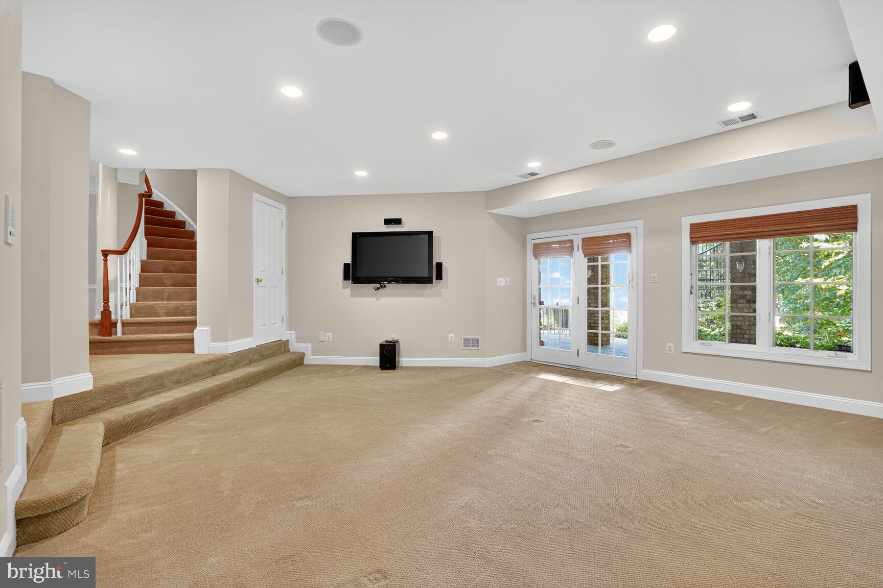 3950 27th Road North Arlington, VA 22207 - Photo 54 of 86 Another view of LL rec room shows door to patio