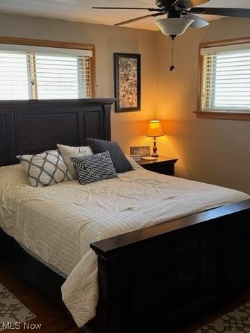 873 Bears Den Road Youngstown, OH 44511 - Photo 7 of 15 Bedroom with dark hardwood flooring and ceiling fan