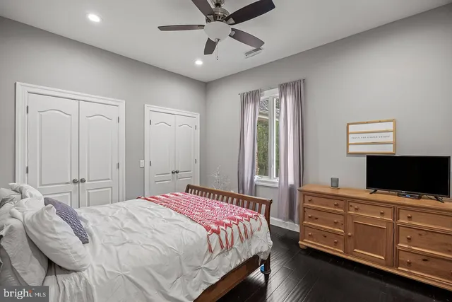 a bed room with a bed and a window