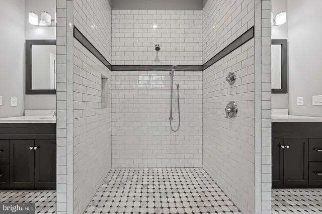 a bathroom with a toilet and a sink