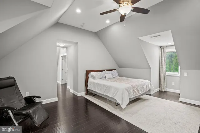 a bed room with a bed and a couch