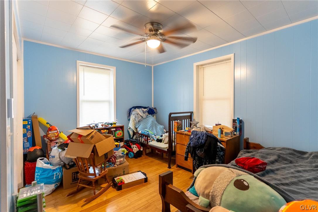4002 Chew Street Allentown, PA 18104 - Photo 13 of 27 a bed room with furniture and a window
