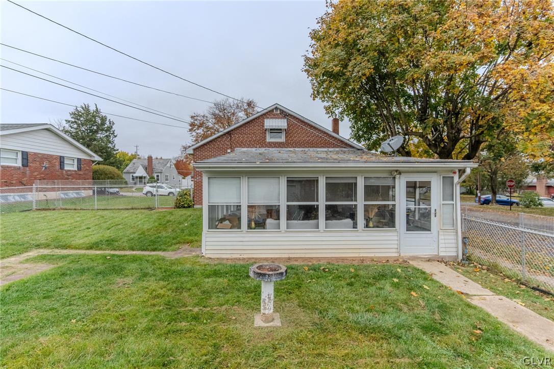 4002 Chew Street Allentown, PA 18104 - Photo 23 of 27 a front view of a house with a yard