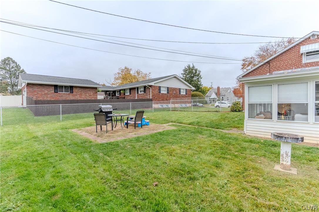 4002 Chew Street Allentown, PA 18104 - Photo 24 of 27 a house view with a sitting space and garden