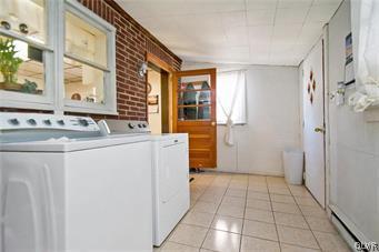4002 Chew Street Allentown, PA 18104 - Photo 10 of 27 a bathroom with a sink and a mirror