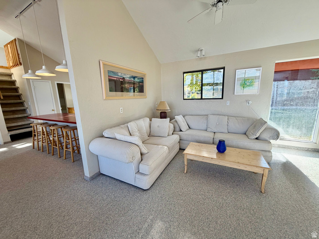 1825 North Cisco Road Laketown, UT 84038 - Photo 11 of 34 Vaulted ceiling with ceiling fan, recessed lighting, and a partially visible staircase