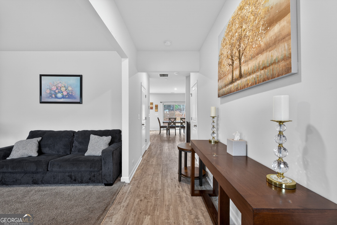 3511 Argent Way Marietta, GA 30008 - Photo 16 of 56 a living room with furniture and wooden floor