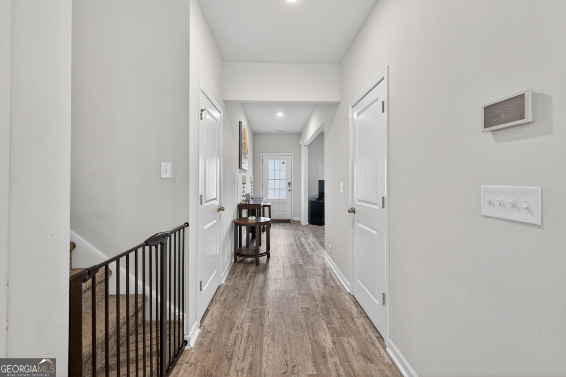3511 Argent Way Marietta, GA 30008 - Photo 19 of 56 a view of a hallway with wooden floor