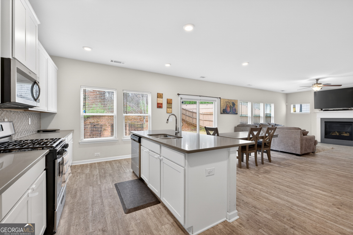 3511 Argent Way Marietta, GA 30008 - Photo 20 of 56 a kitchen with sink and cabinets
