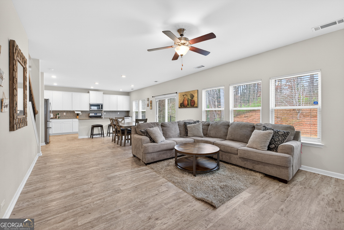 3511 Argent Way Marietta, GA 30008 - Photo 29 of 56 a living room with furniture kitchen view and a window