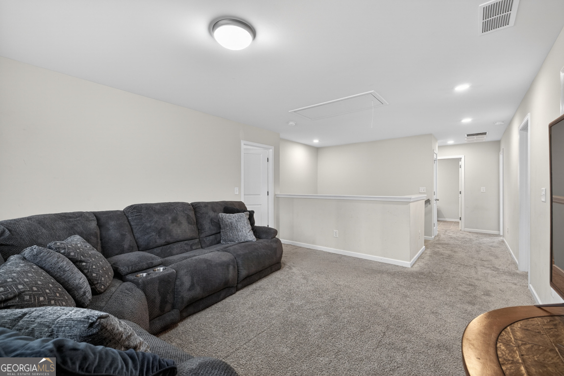 3511 Argent Way Marietta, GA 30008 - Photo 37 of 56 a living room with furniture and a couch