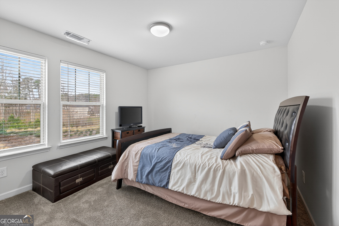 3511 Argent Way Marietta, GA 30008 - Photo 43 of 56 a bedroom with a bed and a window