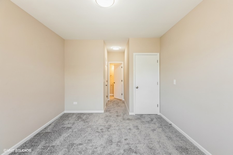 1431 West 108th Street, Unit D Chicago, IL 60643 - Photo 7 of 13 a view of an empty room