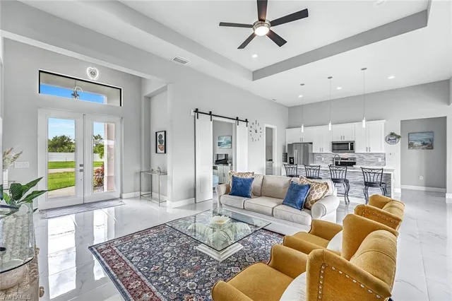 a living room with furniture and a rug