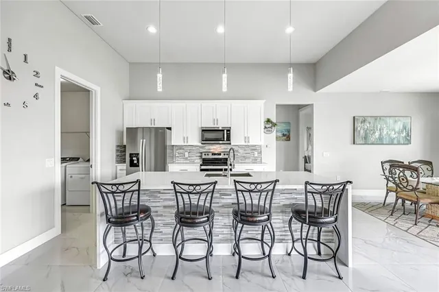 a view of a dining room with furniture
