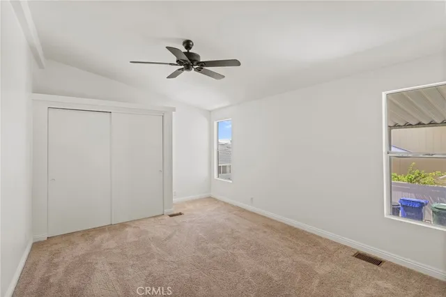 a white bath tub sitting next to a toilet
