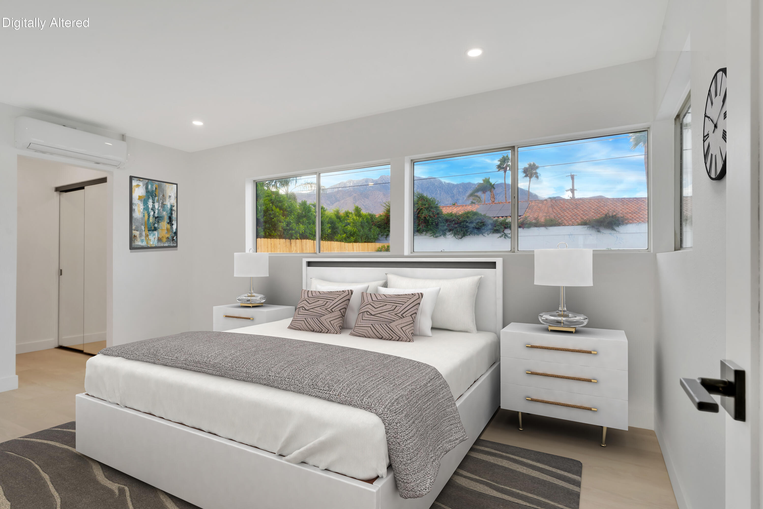 3087 North Biskra Road Palm Springs, CA 92262 - Photo 16 of 31 a bedroom with a bed and a large window