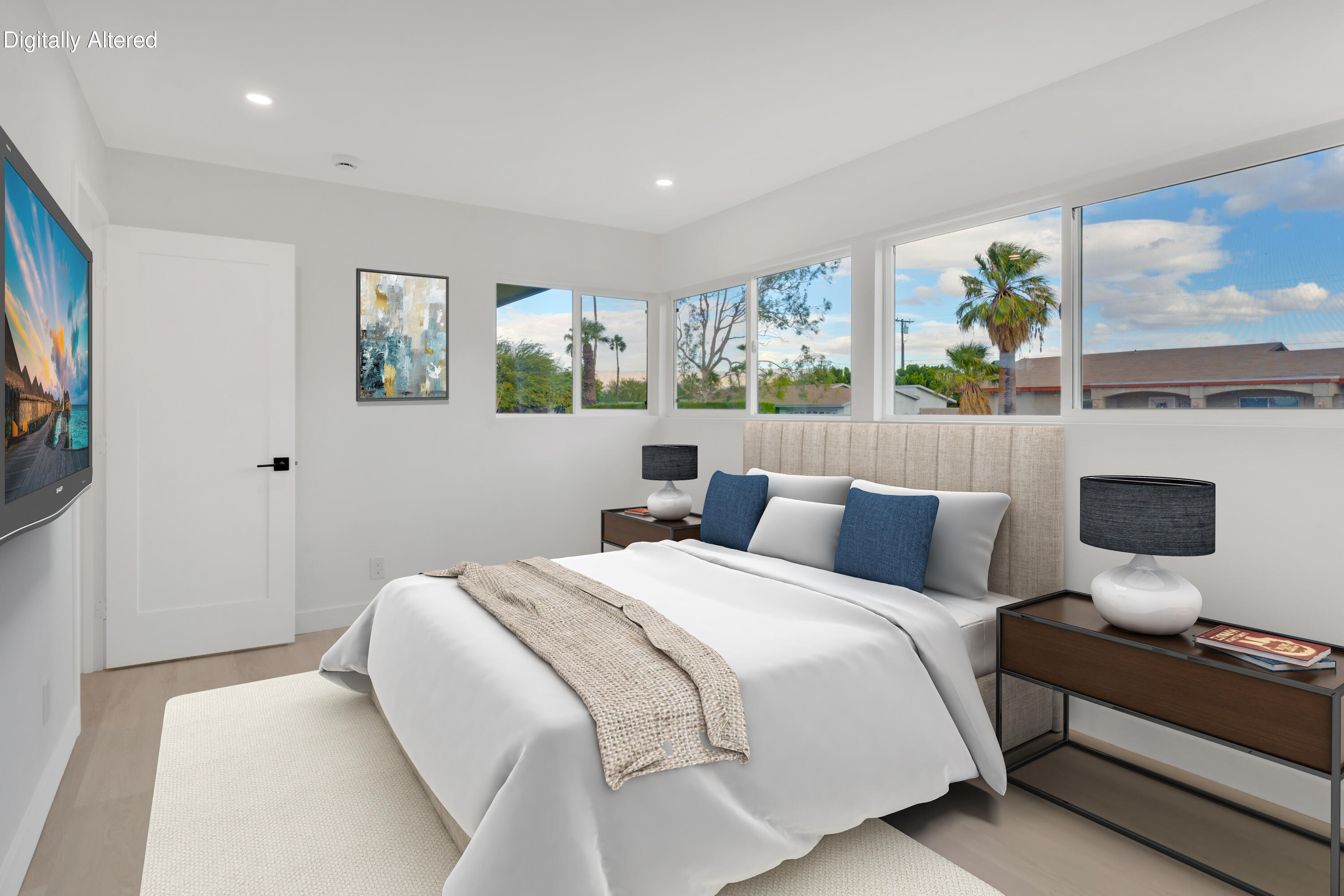 3087 North Biskra Road Palm Springs, CA 92262 - Photo 22 of 31 a bedroom with a bed a large window and flat screen tv