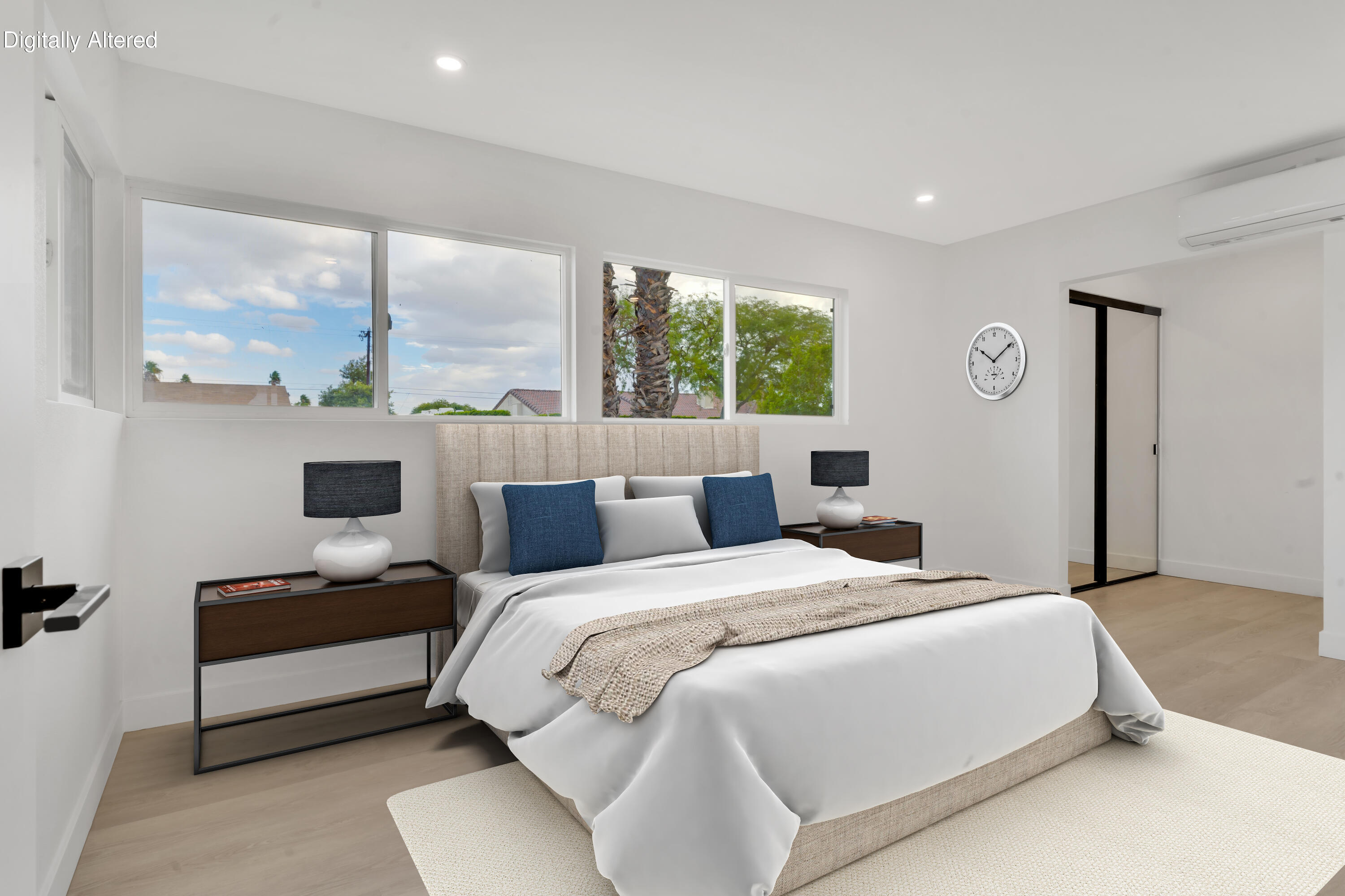 3087 North Biskra Road Palm Springs, CA 92262 - Photo 25 of 31 a bedroom with bed and a large window