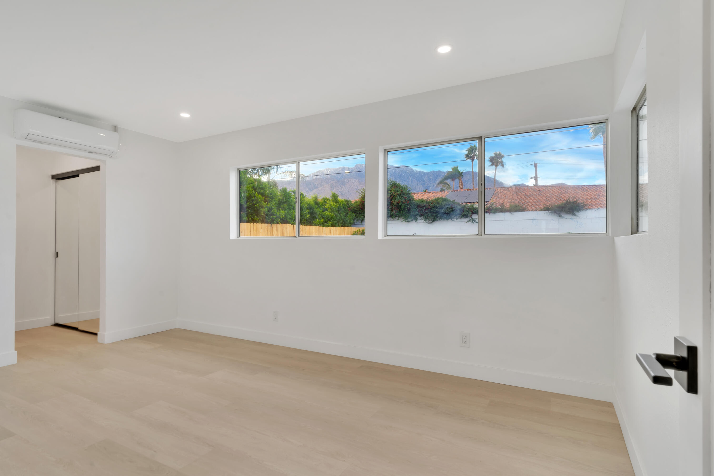 3087 North Biskra Road Palm Springs, CA 92262 - Photo 27 of 31 a view of room with window and ceiling fan