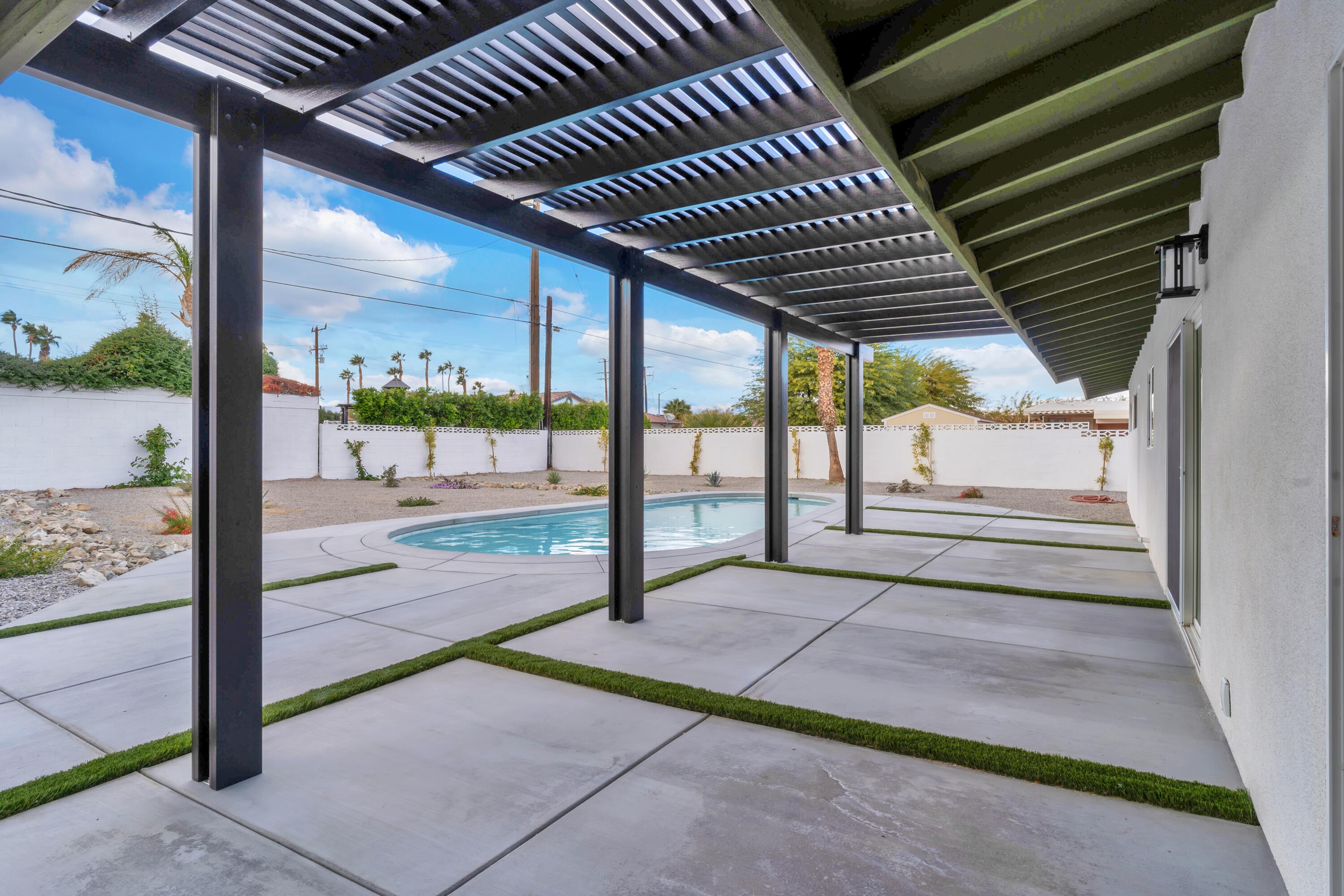 3087 North Biskra Road Palm Springs, CA 92262 - Photo 31 of 31 a view of backyard with a tub
