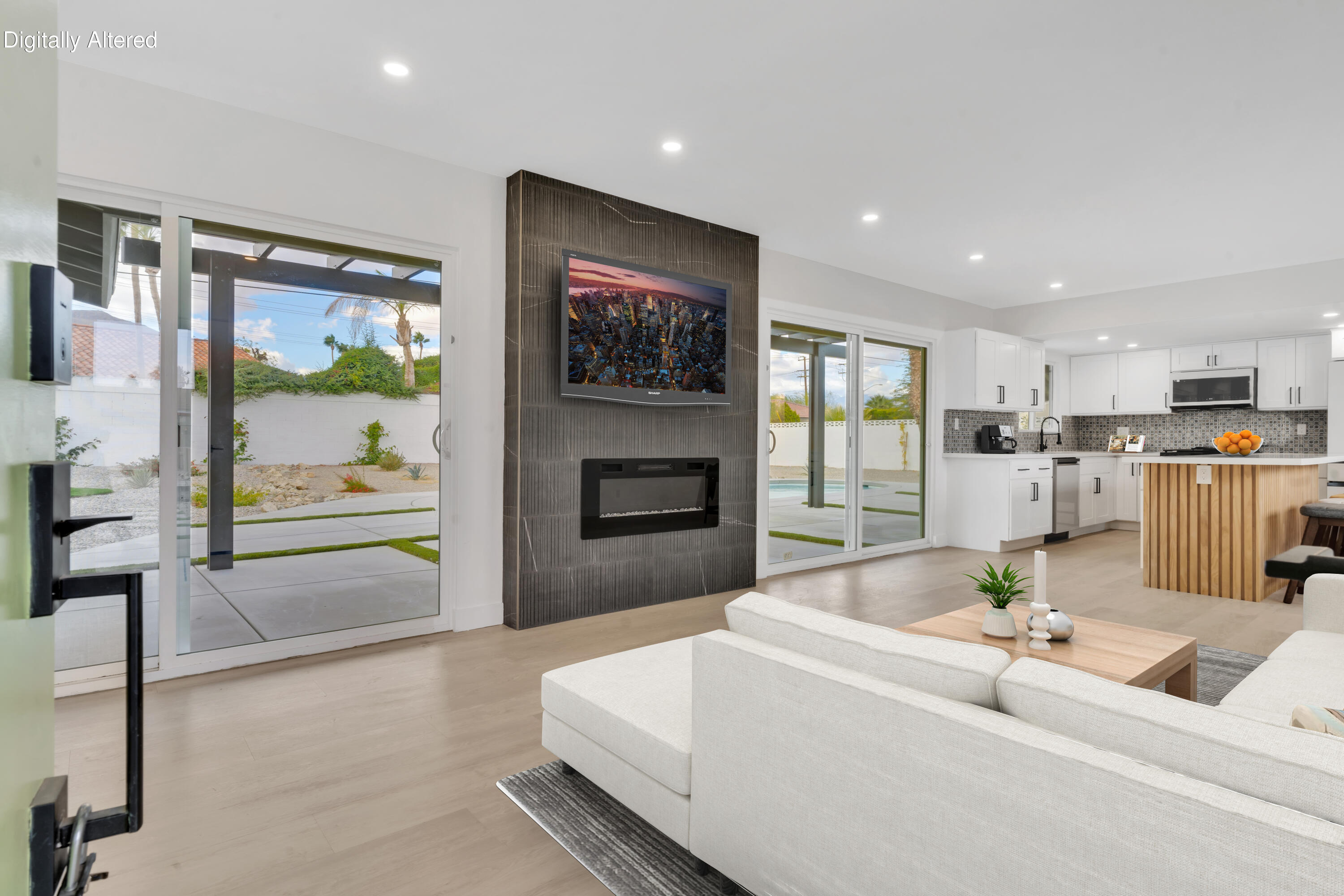 3087 North Biskra Road Palm Springs, CA 92262 - Photo 7 of 31 a living room with furniture and a flat screen tv