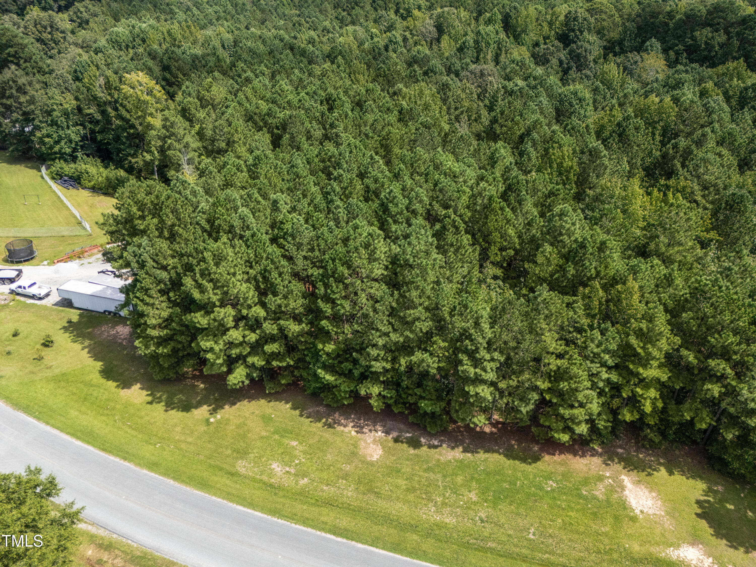 708 John Horton Road Apex, NC 27523 - Photo 9 of 11 a view of swimming pool from a yard