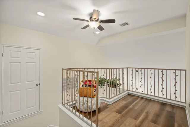 a view of entryway with wooden floor