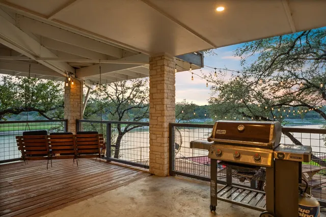 a swimming pool with outdoor seating and yard