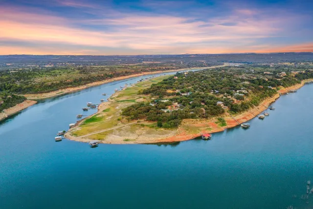 a view of a lake with a city